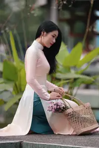 Captivating Grace: Vietnamese Girl in Traditional Ao Dai Beauty 1000025136 - image 5
