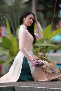 Captivating Grace: Vietnamese Girl in Traditional Ao Dai Beauty 1000025136 - image 10