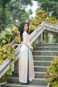 Captivating Grace: Vietnamese Girl in Traditional Ao Dai Beauty 1000025136 - image 11