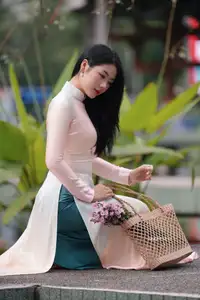 Captivating Grace: Vietnamese Girl in Traditional Ao Dai Beauty 1000025136 - image 19