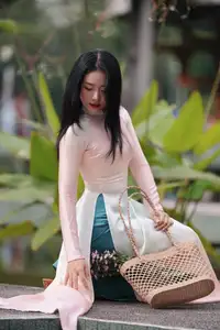 Captivating Grace: Vietnamese Girl in Traditional Ao Dai Beauty 1000025136 - image 7