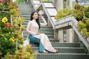 Captivating Grace: Vietnamese Girl in Traditional Ao Dai Beauty 1000025136 - image 8
