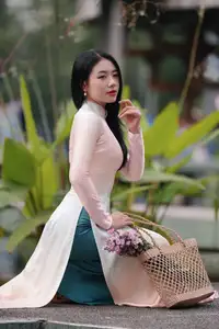 Captivating Grace: Vietnamese Girl in Traditional Ao Dai Beauty 1000025136 - image 4