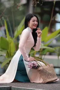 Captivating Grace: Vietnamese Girl in Traditional Ao Dai Beauty 1000025136 - image 9