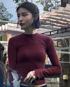 Elegant Archery Session: Saigon Socialite Captivates with Sharp Style and Grace - image 4