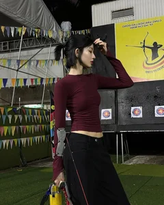 Elegant Archery Session: Saigon Socialite Captivates with Sharp Style and Grace - image 1