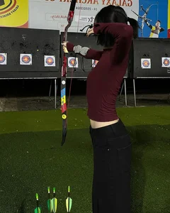 Elegant Archery Session: Saigon Socialite Captivates with Sharp Style and Grace - image 9