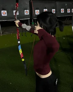 Elegant Archery Session: Saigon Socialite Captivates with Sharp Style and Grace - image 2