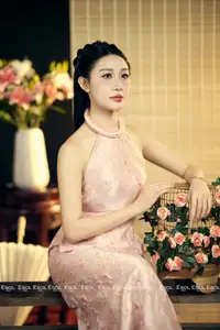 Serene Asian Beauty: Discover A Graceful Woman In A Traditional Pink Dress Amidst Blossoms. - image 1