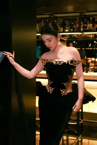 Radiant in Blue: A Woman's Elegant Charm Shines Bright in a Luxurious - image 3