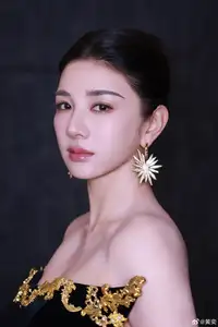 Radiant in Blue: A Woman's Elegant Charm Shines Bright in a Luxurious - image 7