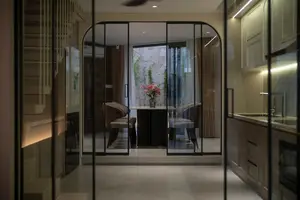 Light-Filled Tube House: Discover Unique Arched Facade & Green Urban Living - image 7