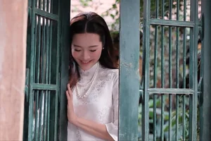 Karen Nguyen radiates timeless elegance in a pure white traditional Ao Dai - image 6