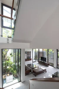 Minimalist Sanctuary: Elevating Modern Living with Floor-to-Ceiling Glass Walls and Lush Indoor Greenery - image 0