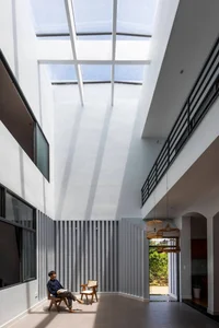 Minimalist Sanctuary: Elevating Modern Living with Floor-to-Ceiling Glass Walls and Lush Indoor Greenery - image 13