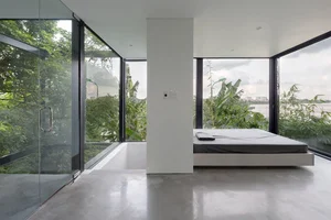 Minimalist Sanctuary: Elevating Modern Living with Floor-to-Ceiling Glass Walls and Lush Indoor Greenery - image 14