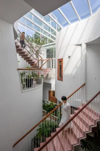 Minimalist Sanctuary: Elevating Modern Living with Floor-to-Ceiling Glass Walls and Lush Indoor Greenery - image 10