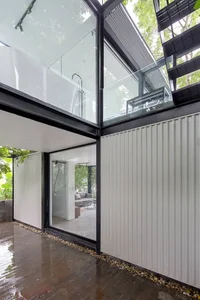 Minimalist Sanctuary: Elevating Modern Living with Floor-to-Ceiling Glass Walls and Lush Indoor Greenery - image 8