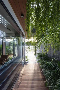 Minimalist Sanctuary: Elevating Modern Living with Floor-to-Ceiling Glass Walls and Lush Indoor Greenery - image 17