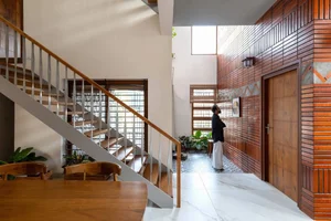 Modern 232m2 Two-Story Teacher’s Home Featuring Inner Courtyard and Natural Light for a Perfect Study Environment - image 1