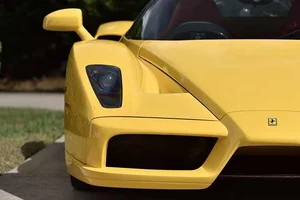 The 16.5 Million Dollar Legend: A Timeless Ferrari Enzo Captured in Radiant Yellow - image 1