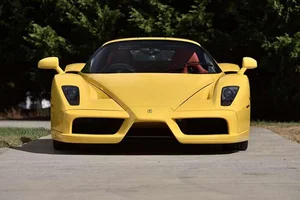 The 16.5 Million Dollar Legend: A Timeless Ferrari Enzo Captured in Radiant Yellow - image 11