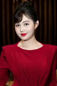 Captivating Asian Beauty: The Elegant Woman in Red with a Charming Smile and Confident Aura - image 4