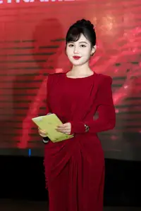Captivating Asian Beauty: The Elegant Woman in Red with a Charming Smile and Confident Aura - image 7