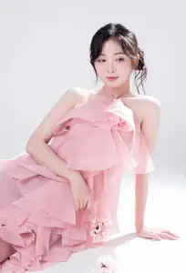 Discover Feminine Elegance: A Girl in a Pink Dress with Pristine Flowers - image 2