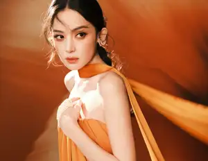 Captivating Beauty: Goddess in a Vibrant Orange Gown, Exuding Elegant Allure. - image 6