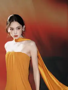 Captivating Beauty: Goddess in a Vibrant Orange Gown, Exuding Elegant Allure. - image 10