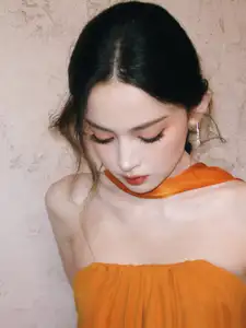 Captivating Beauty: Goddess in a Vibrant Orange Gown, Exuding Elegant Allure. - image 4