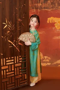 Adorable Tet Moments: Vietnamese Celebrity Kids Shine in Traditional Ao Dai - image 2