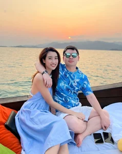 Elegant Couple Style: Exploring the Sophisticated Fashion Choices of Do My Linh and Her Husband - image 1