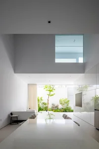 Minimalist White House Design in Ho Chi Minh City: A Serene Urban Oasis Featuring Lush Indoor Greenery and Modern Architecture - image 8