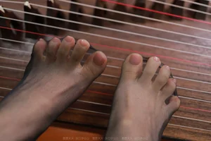 Traditional Elegance: IESS Special Featuring Xiao Liu in Red Dress with Guzheng - image 4