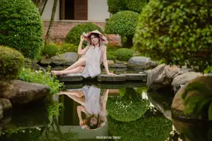 Graceful Young Woman in a Dreamy Garden: A Serene and Elegant Moment 1000025211 - image 7