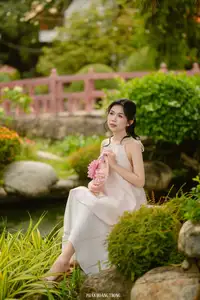 Graceful Young Woman in a Dreamy Garden: A Serene and Elegant Moment 1000025211 - image 11