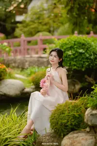 Graceful Young Woman in a Dreamy Garden: A Serene and Elegant Moment 1000025211 - image 6