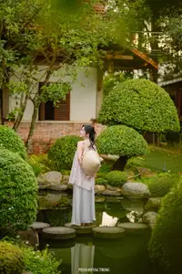 Graceful Young Woman in a Dreamy Garden: A Serene and Elegant Moment 1000025211 - image 10