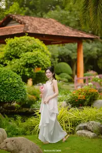 Graceful Young Woman in a Dreamy Garden: A Serene and Elegant Moment 1000025211 - image 2