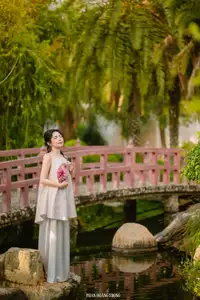 Graceful Young Woman in a Dreamy Garden: A Serene and Elegant Moment 1000025211 - image 0