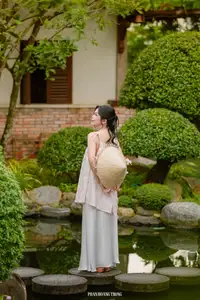 Graceful Young Woman in a Dreamy Garden: A Serene and Elegant Moment 1000025211 - image 8