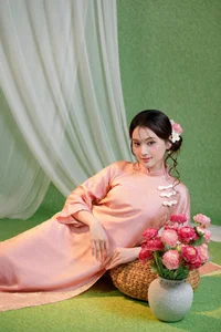 Elegant Muse in Pastel Pink Traditional Attire - image 4