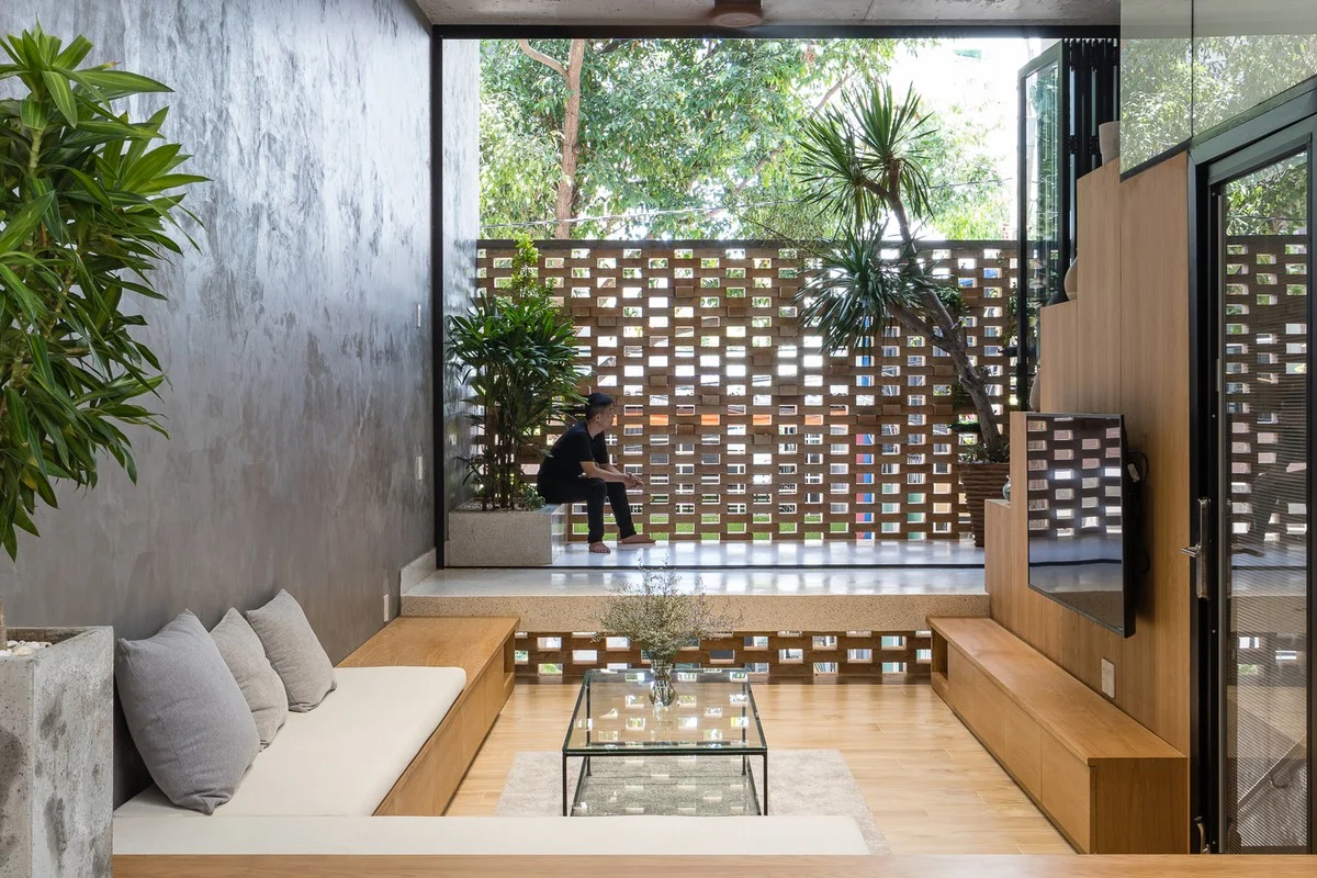 Innovative Double-Shell Architecture: A Modern Sun-Protected Townhouse Design in Vung Tau Coastal City