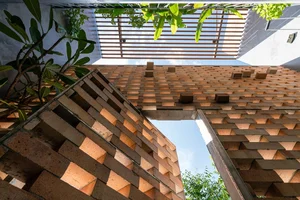 Innovative Double-Shell Architecture: A Modern Sun-Protected Townhouse Design in Vung Tau Coastal City - image 3