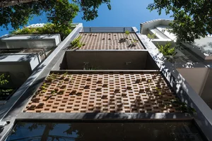 Innovative Double-Shell Architecture: A Modern Sun-Protected Townhouse Design in Vung Tau Coastal City - image 2