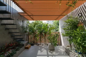Innovative Double-Shell Architecture: A Modern Sun-Protected Townhouse Design in Vung Tau Coastal City - image 7