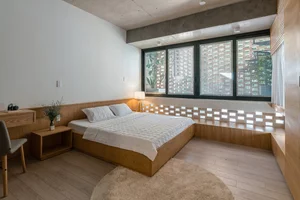 Innovative Double-Shell Architecture: A Modern Sun-Protected Townhouse Design in Vung Tau Coastal City - image 8