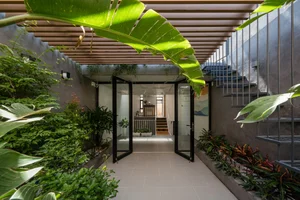 Innovative Double-Shell Architecture: A Modern Sun-Protected Townhouse Design in Vung Tau Coastal City - image 4